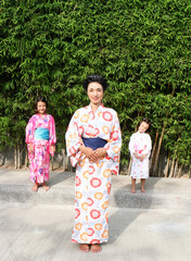 Family dressed in kimono.