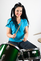 Fototapeta na wymiar Beautiful drummer woman
