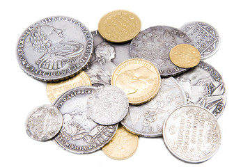 Old russian gold and silver coins isolated on white background