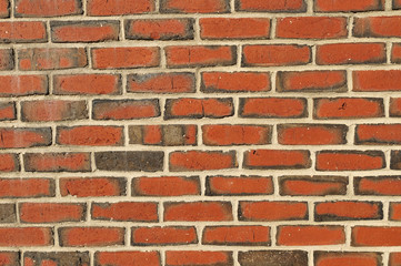 Bright and colorful brick wall with cracks - background texture