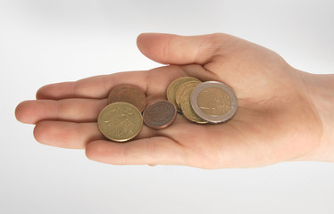 hand mit münzgeld