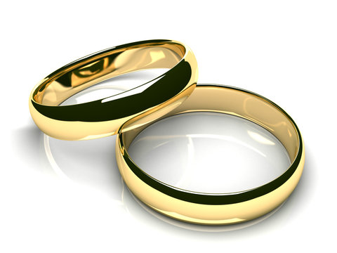 Two gold wedding rings on white glossy background (3D render)