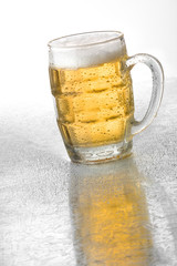 Glass of cold beer with condensation drops
