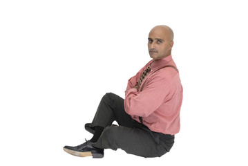 Seated businesman  isolated against a white background