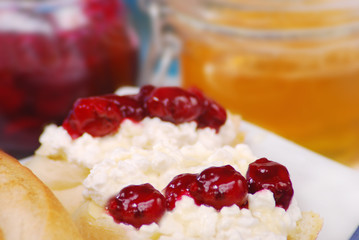 baquette with cottage cheese,cherry confiture and honey