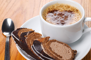 close-up cup of coffee with dessert