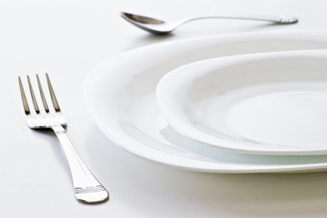 closeup of white place setting