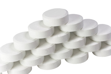 Pile of white pills (isolated on white)