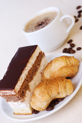 cup of coffee with dessert
