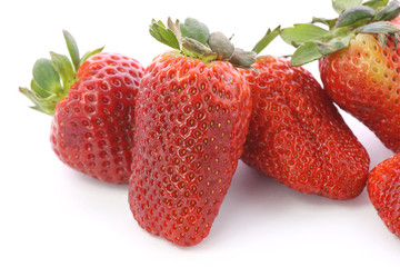 Strawberries over white background