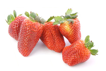 Strawberries over white background