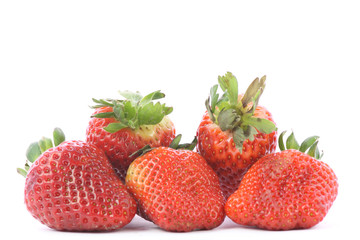 Strawberries over white background