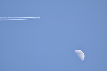 Clear Sky with Plane and Moon