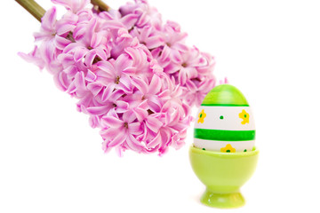 easter egg and flower isolated on white