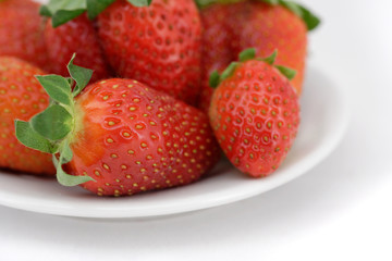Fresh strawberry on a plate.