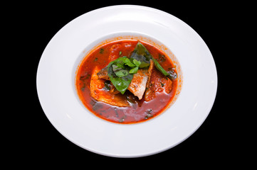 Cooked fish in a plate.