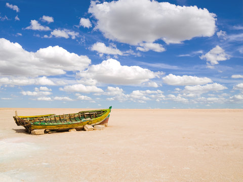 Old boat on a dry lake