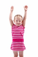 Cute child with hands up on white