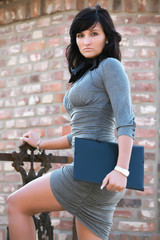 Very Busty and sexy Businesswoman with filofax briefcase