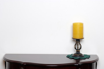Table with a wax candle lamp