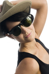 attractive young sexy woman with hat and sunglasses