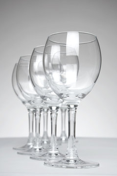 Still-life with empty glasses over white background_3