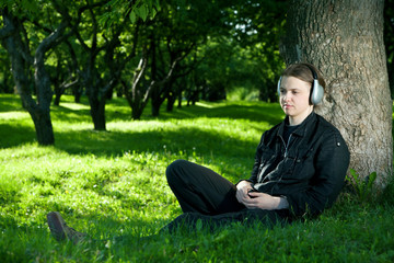 Obraz premium A Young Man Under The Tree