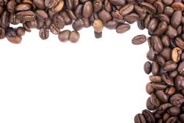 Coffee beans in corner isolated on white background. Empty space