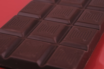 chocolate bar on red