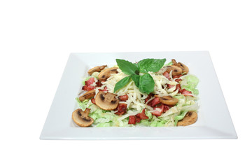 fresh salad with mushrooms, cheese and fried bacon