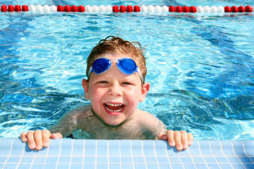 Happy child in a swimming pool - 13244988