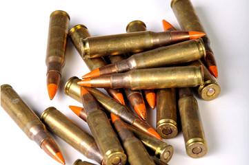 Pile of bulllets on white background.