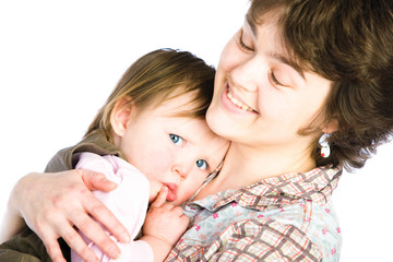 Girl hugs her little sister