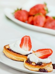 Pancakes on plate with strawberry