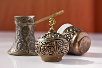 Traditional engraved bronze coffee maker