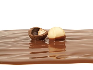 Macadamia auf flüssiger Schokolade