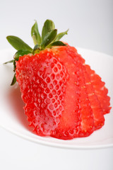 strawberry on a white plate