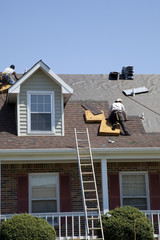 Roofers working