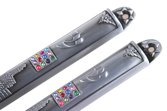 two metal mezuza's cases