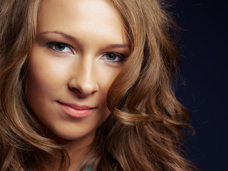 Fototapeta premium Young woman closeup portrait