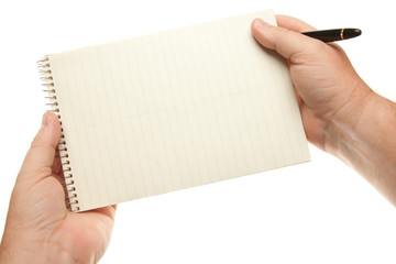 Obraz premium Male Hands Holding Pen and Pad of Paper