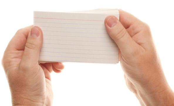 Male Hand Holding Stack Of Flash Cards