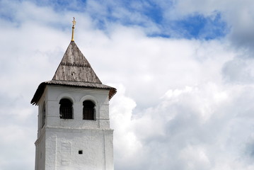 white russian style tower in the clouds