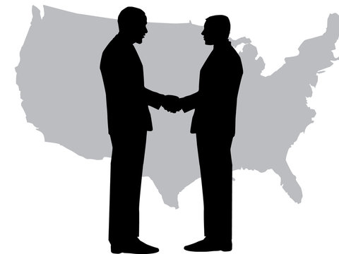A silhouette of men handshaking with map of USA