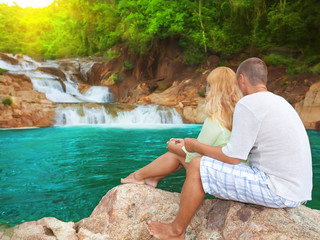 Couple near waterfall