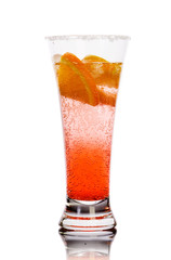 Red drink with ice and lemon isolated over white. Studio.