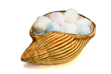 Periwinkle filled with colored cotton balls