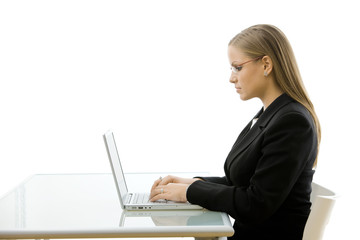 Businesswoman working on laptop