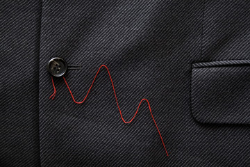 sack coat with red string