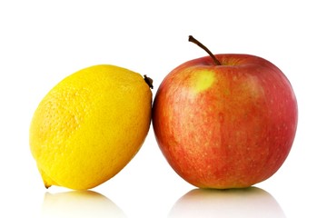 Lemon and apple isolated on white background